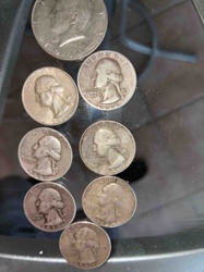 Assortment of U.S. Coins: Kennedy Half Dollar and Washington Quarters