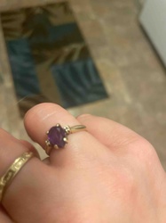 Gold Ring with Oval Purple Gemstone and Side Accents