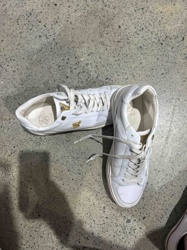 White Low-Top Sneakers with Gold Emblems
