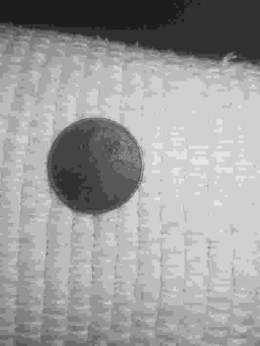 Heavily Circulated Copper Coin