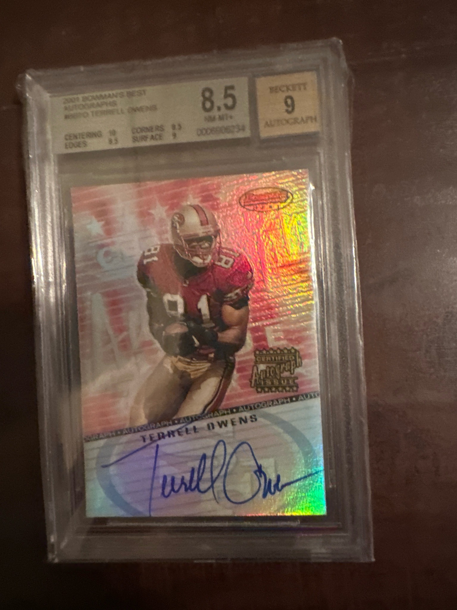 Submitted photo of graded trading card with signature in the style of a 2001 Bowman's Best football card