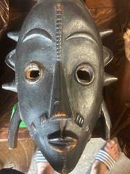 African Tribal Wooden Mask with Spikes and Geometric Carvings