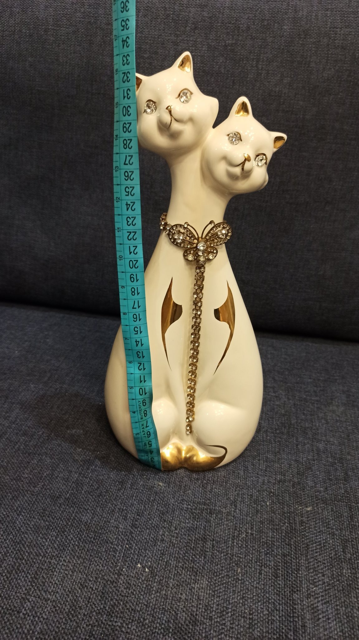 Submitted photo of Glazed ceramic two-headed cat figurine