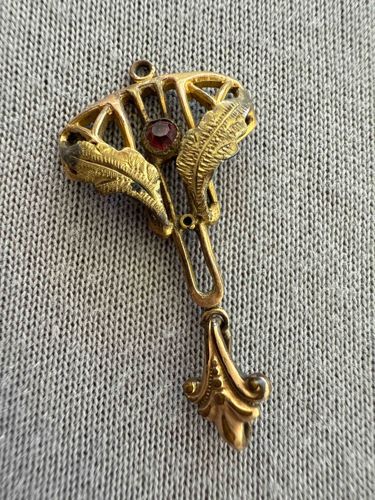 Art Nouveau Style Gold-Toned Pendant with Garnet Cabochon