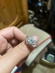 Silver-Toned Ring with Central Round Faceted Stone and Pavé Accents