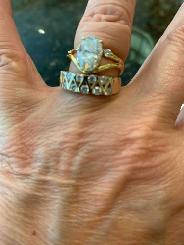 Gold-Toned Two-Ring Set with Oval and Round Clear Gemstones