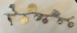 Sterling Silver Charm Bracelet with Various Charms