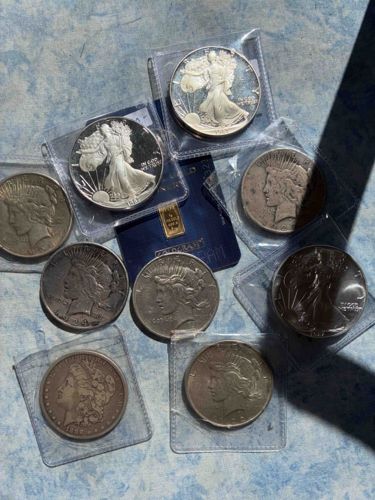 Assortment of American Silver Dollars and Gold Bar