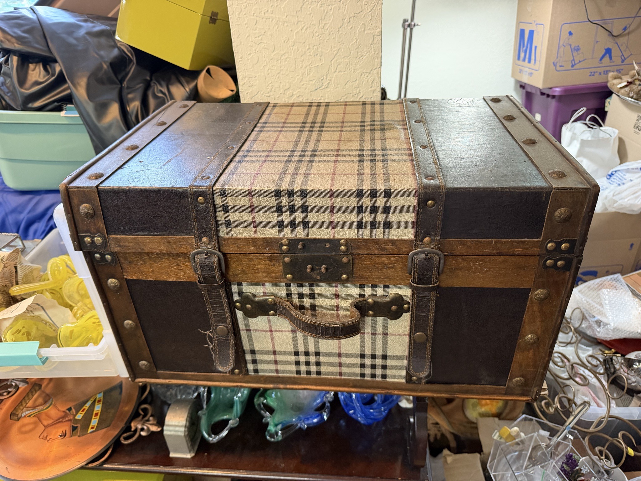 Submitted photo of Vintage plaid and leather travel trunk