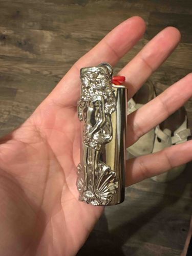 Stussy Chrome Lighter with Mermaid Relief