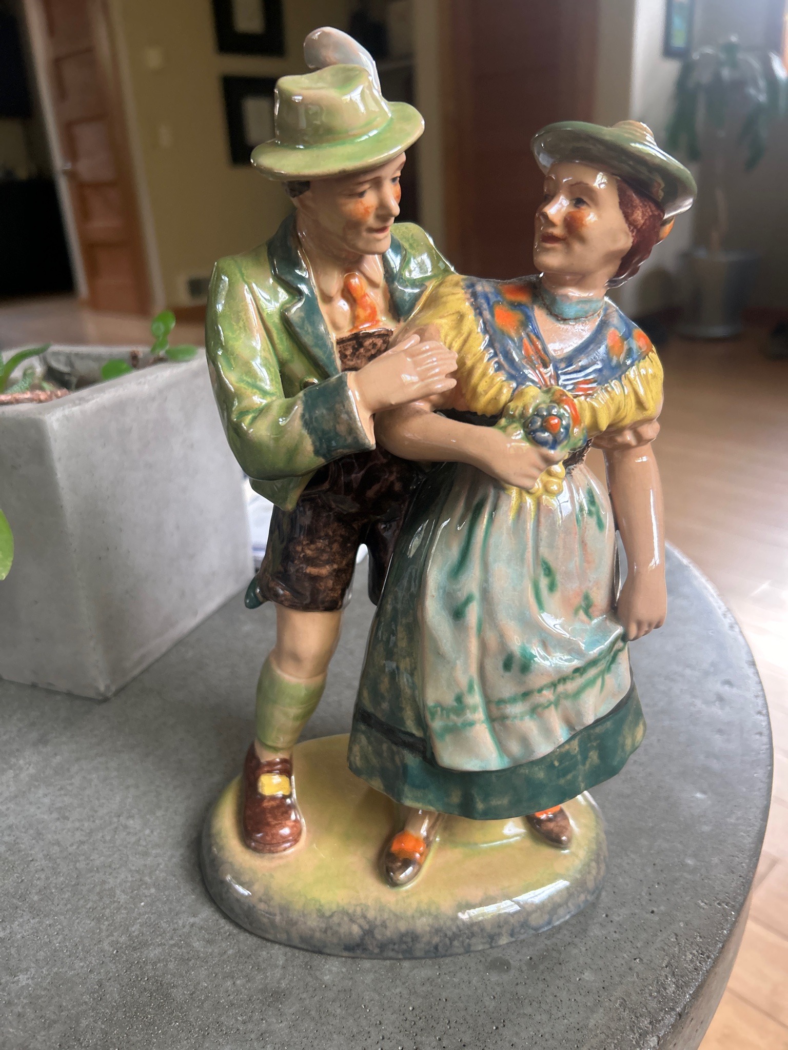 Submitted photo of Hand-painted ceramic figurine of a dancing couple in traditional European folk attire