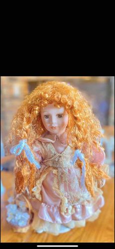 Musical Porcelain Doll with Red Hair