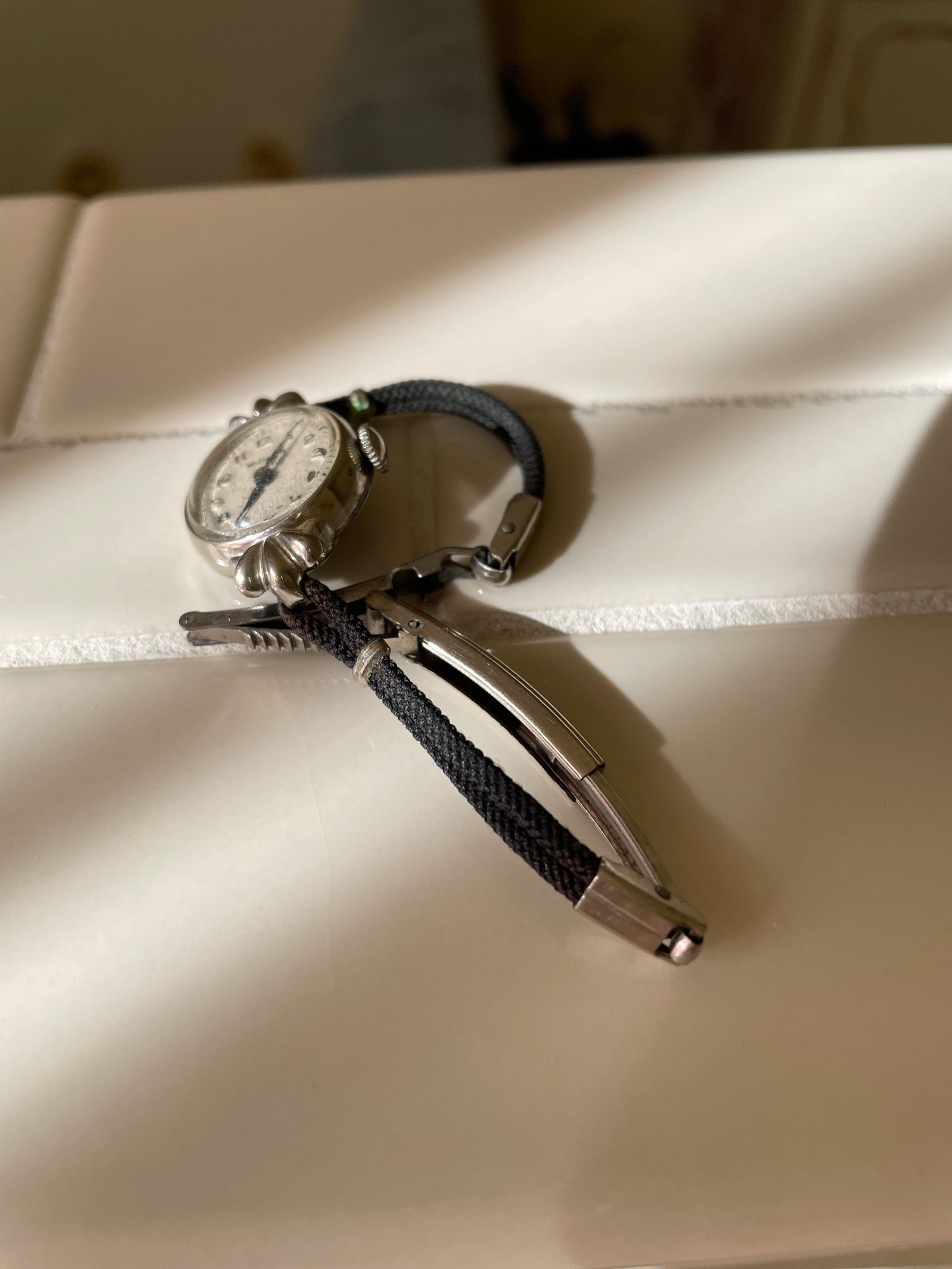Submitted photo of Vintage mechanical nurse's lapel watch (not authenticated)