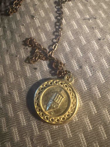 Gold-Tone Crest Pendant Necklace