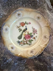 Iridescent Porcelain Plate with Peacock and Floral Motif