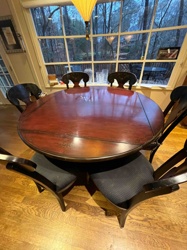 Oval Pedestal Dining Table with Matching Chairs