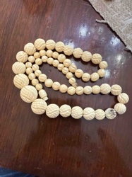 Graduated Carved Bead Strand