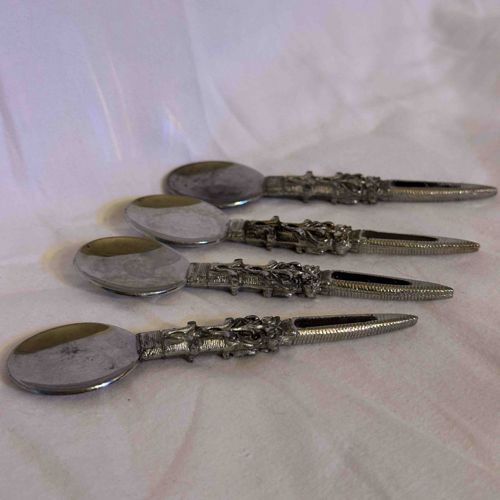 Set of Four Ornate Fruit/Orange Spoons