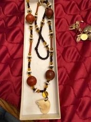 Multi-strand Beaded Necklace with Carved Pendant