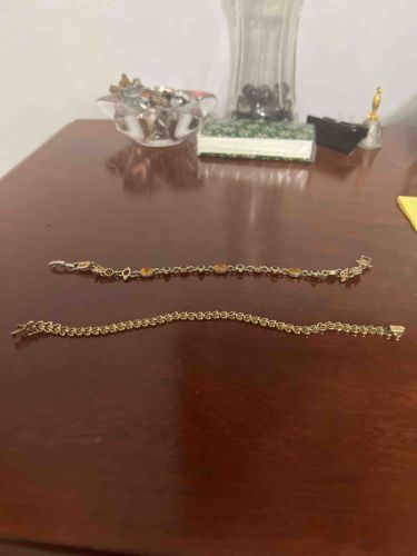 Two Gold-Toned Bracelets