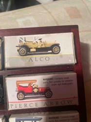 Collection of ALCO and Pierce Arrow Die-cast Model Cars in Display Case