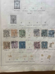 Vintage Stamp Album Page with Portuguese and other Stamps