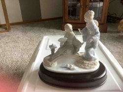 Porcelain Figurine of Two Women in a Garden Scene