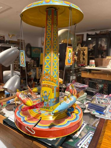 J. Channin Co. Lithographed Tin Wind-Up Rocket Ship Amusement Park Ride