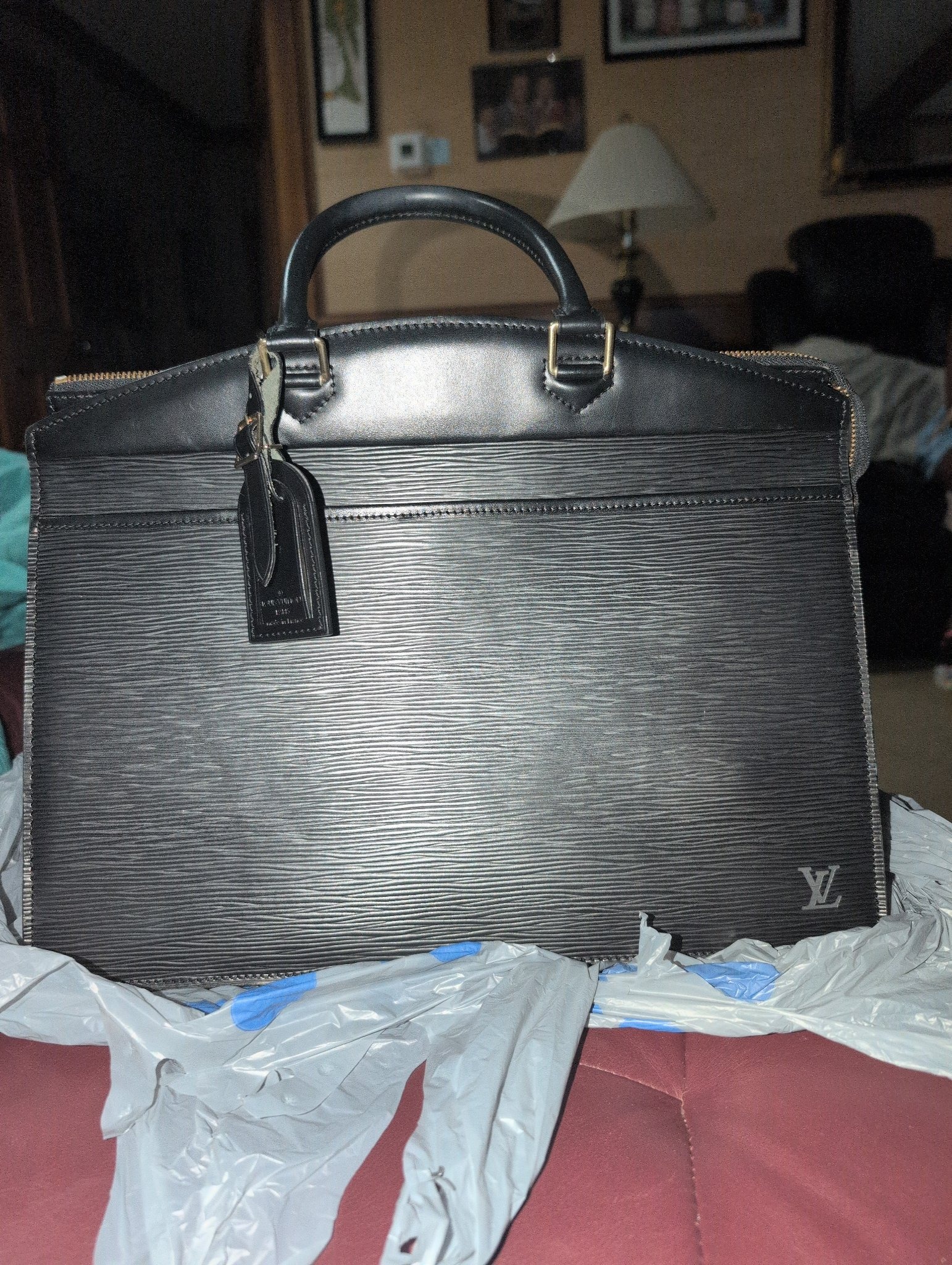 Submitted photo of Louis Vuitton black leather handbag (not authenticated)