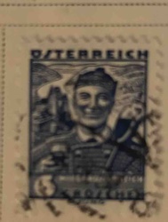 Austrian "Oesterreich" Postage Stamp featuring a smiling man in traditional attire