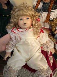 Blonde Porcelain Doll in White Romper