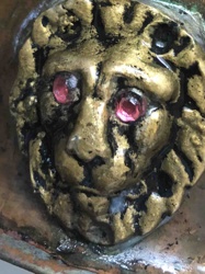 Gilt and Patinated Lion's Head Applique with Jeweled Eyes