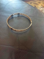 Gold-Toned Filigree Bangle Bracelet