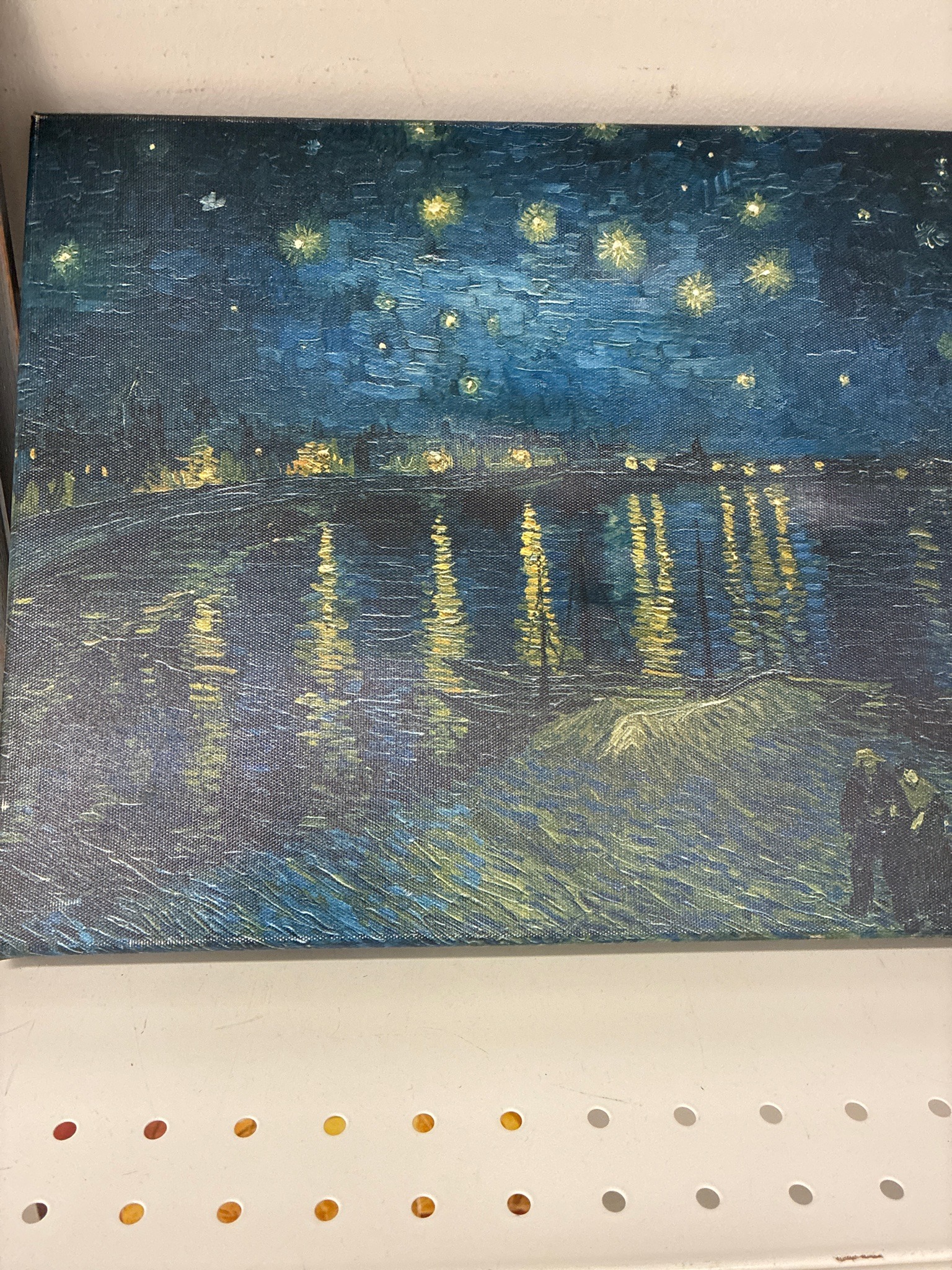 Submitted photo of Canvas print reproducing 'Starry Night Over the Rhône' after Vincent van Gogh (not authenticated)