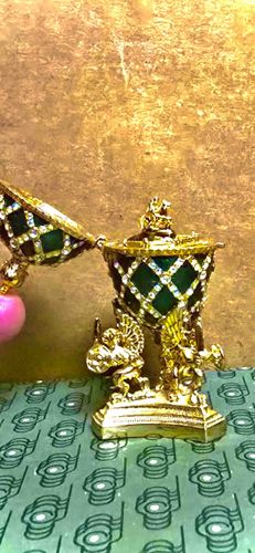 Decorative Hinged Egg on Figural Base
