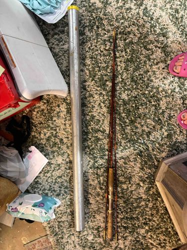 Vintage Multi-Piece Fishing Rod with Aluminum Case