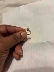 Gold Solitaire Engagement Ring with Diamond Accents
