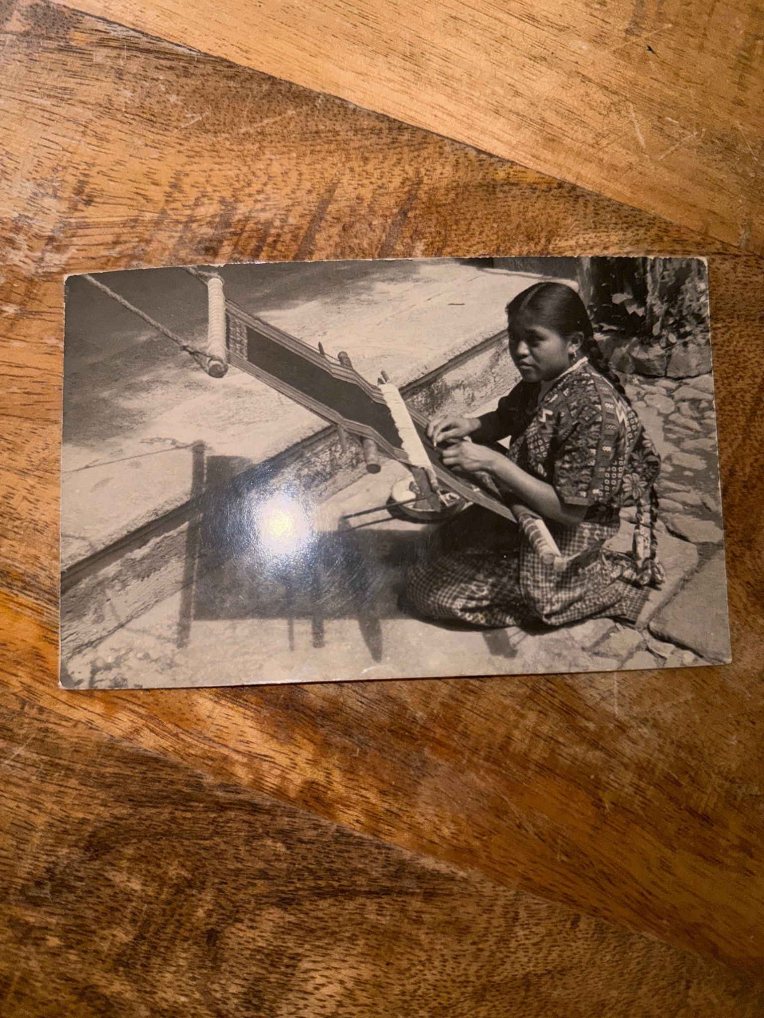 Submitted photo of Vintage Black and White Photographic Postcard Depicting a Backstrap Weaver