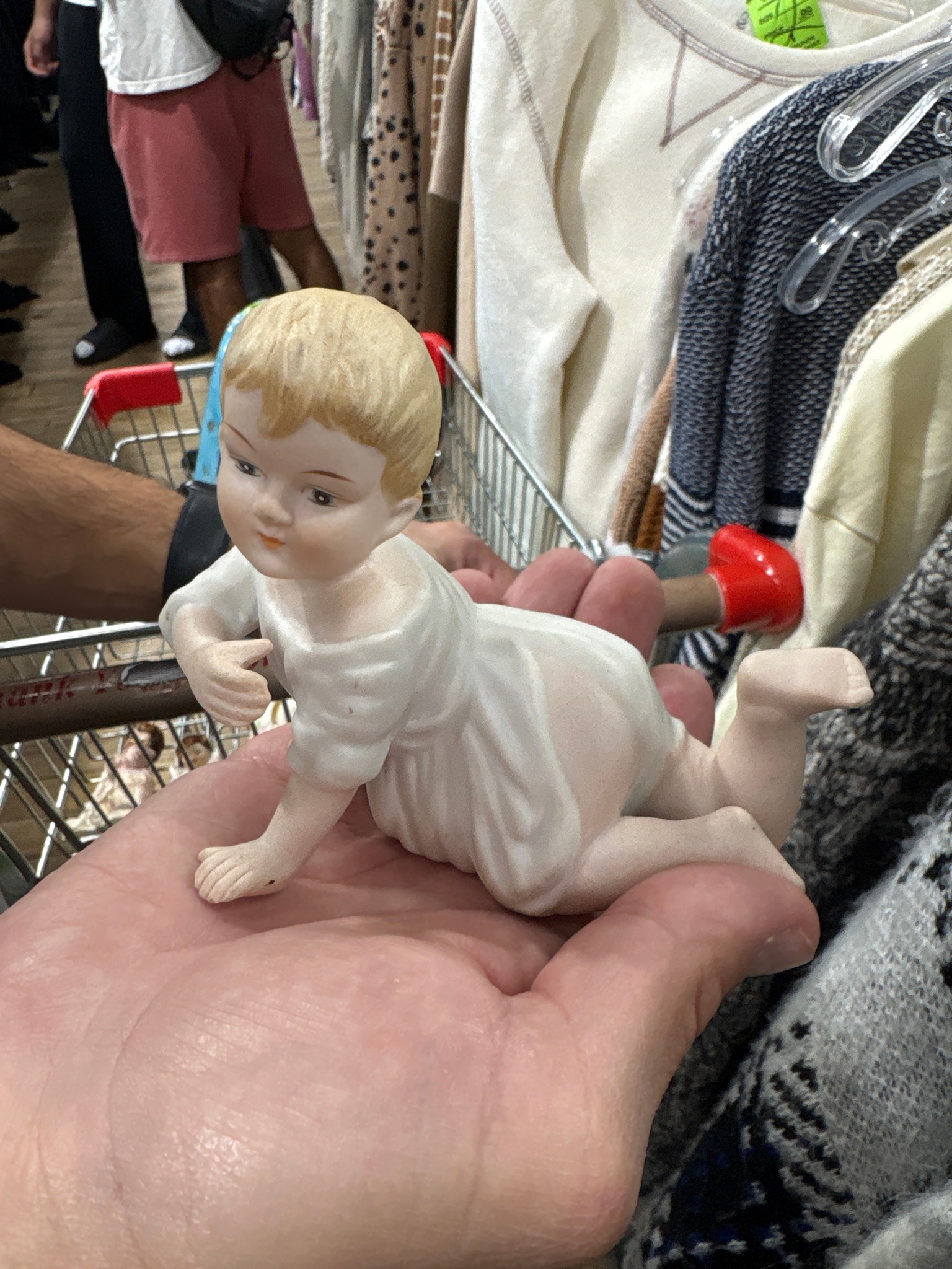 Submitted photo of Bisque porcelain crawling infant figurine (unauthenticated)