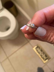 Silver-Toned Ring with Central Gemstone and Pave-Set Accents
