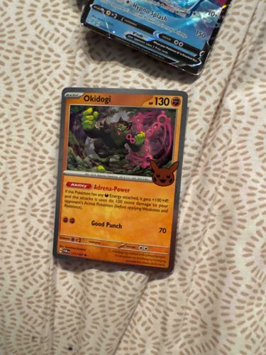 Okidogi Pokemon Card from Trick or Trade BOOster Bundle 2024