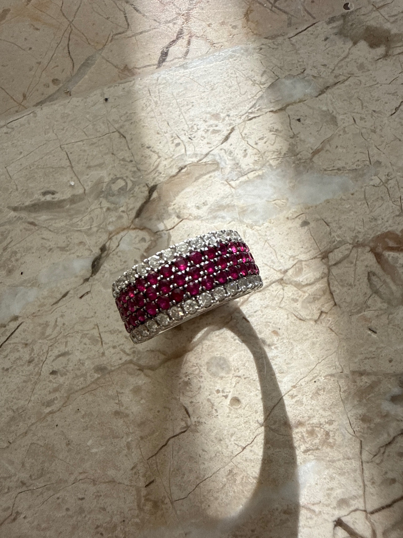 Submitted photo of Multi-row diamond and ruby band ring in the estate style