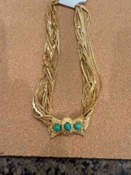 Multi-Strand Gold-Tone Necklace with Faux Turquoise Bow Pendant