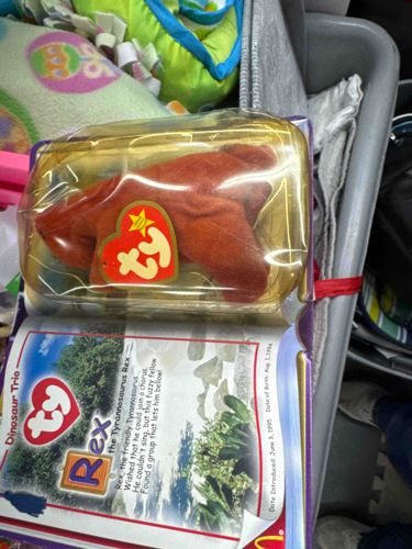 Ty Beanie Baby Rex the Tyrannosaurus Rex in McDonald's Happy Meal packaging