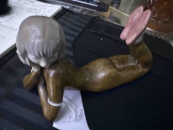 Lying Female Figurine with Bob Cut