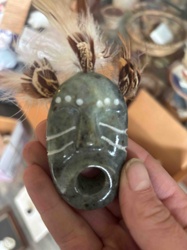 Alaskan Native Style Carved Stone Mask with Feather Adornments