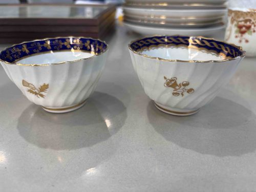 Pair of Gilt-Decorated Blue and White Ceramic Bowls