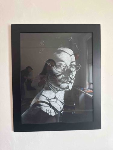 Framed Black and White Portrait Photograph with Shadow Play