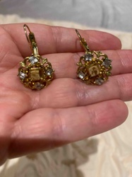 Ornate Gold-Tone Drop Earrings with Central Element and Clear Gemstones