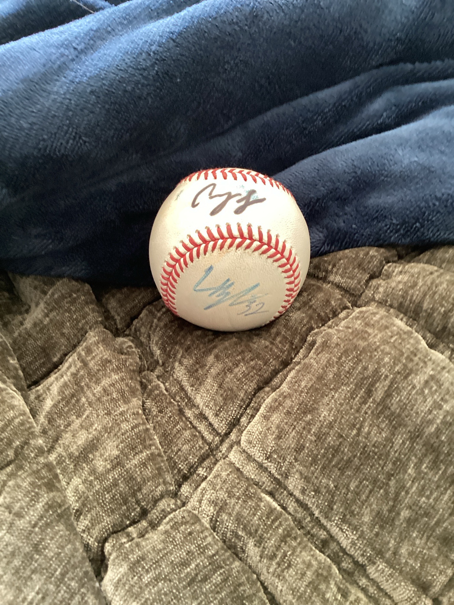 Submitted photo of Autographed baseball bearing signatures (unauthenticated)